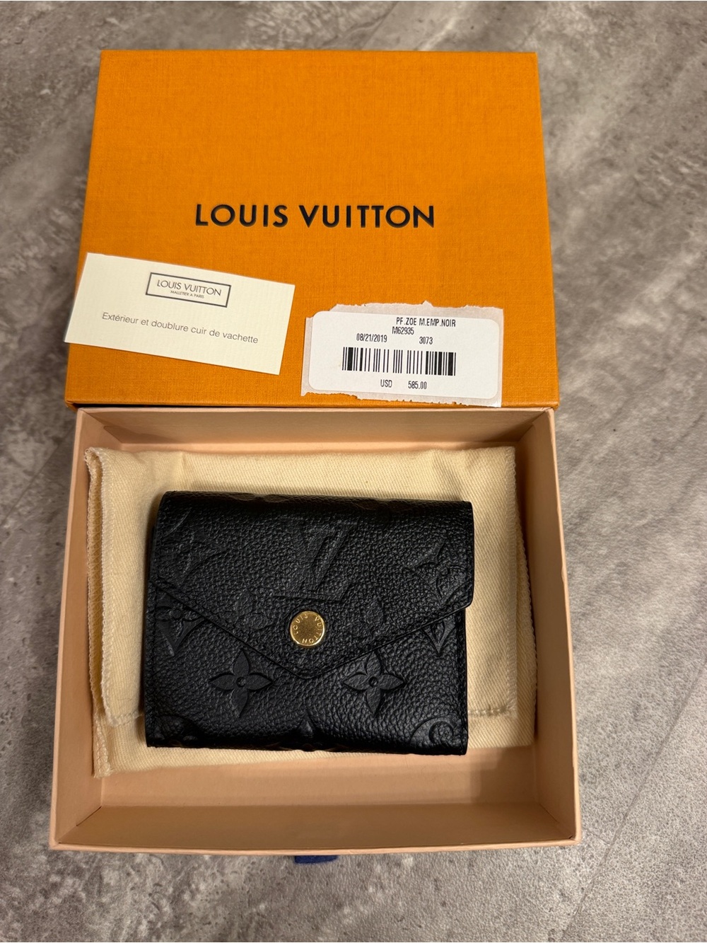 Authentic Louis Vuitton Black Embossed Leather Victorine Wallet